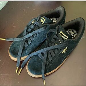black suede pumas